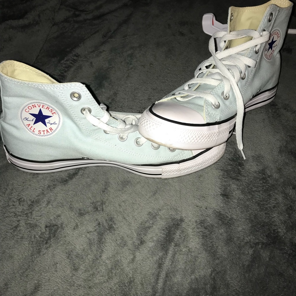 Light blue high top converse